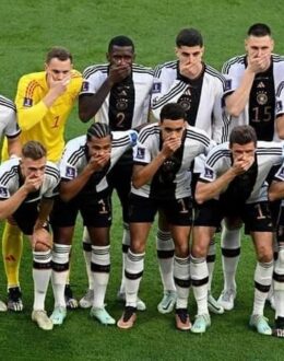 Germany players cover mouths in team photo amid armband row