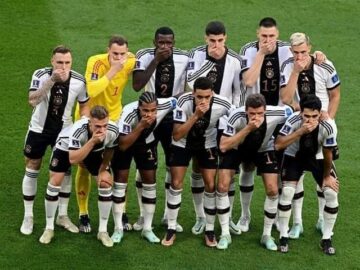 Germany players cover mouths in team photo amid armband row