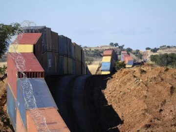 Arizona agrees to remove border wall of shipping containers