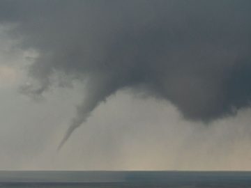 Rare tornado near Los Angeles rips building roofs; 1 injured