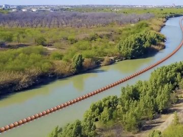 A judge will consider if Texas can keep its floating barrier to block migrants