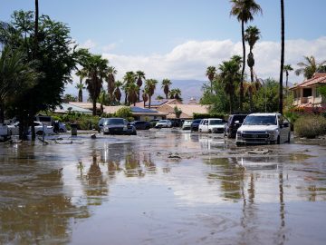 California mountain and desert towns dig out of the mud from 1st tropical storm in 84 years