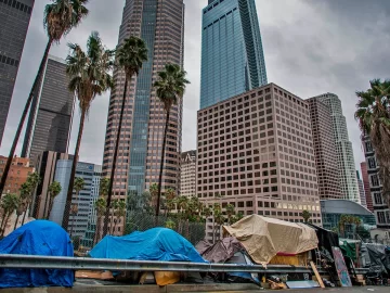 Unite Here Local 11 seeks to reduce the problem of homeless people by housing them in hotels next to paying guests