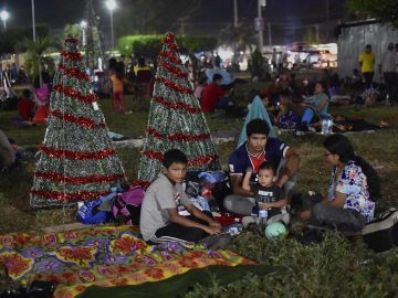 Thousands join Christmas Eve migrant caravan – the biggest in more than a year
