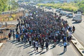 Migrant encounters at the U.S.-Mexico border hit a record high at the end of 2023