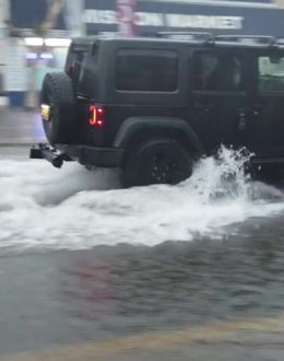 Rain, hail and lightning prompt flood advisories, force beach closures across SoCal