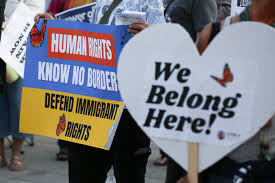 “We Won’t Be Silent”: Immigrant Rights Groups Protest Raids with Marches and Boycotts