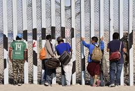 In Tijuana, Migrants Face Two Paths: Persecution or Employment Across the Border