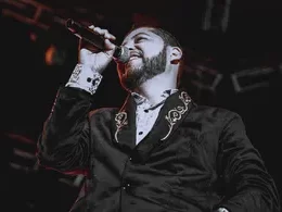 Lead singer of Los Titanes de Durango hit in the face with a bottle during a concert