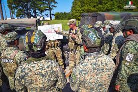 Elite members of the Mexican Army traveled to the United States for specialized training. Elite members of the Mexican Army traveled to the United States for specialized training.