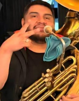 Band plays its last concert; guitarist kills tuba player with a knife