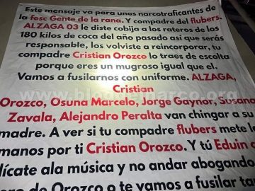 Still smarting over 180 kg of cocaine in Tijuana, a narco-banner threatens Grupo Firme frontman Eduin Caz for meddling in cartel affairs.